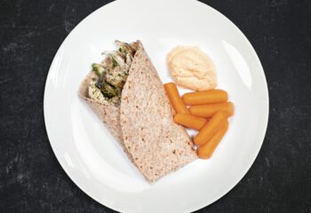 Caprese Chicken Wrap with Basil Pesto Aioli on Sprouted Grain